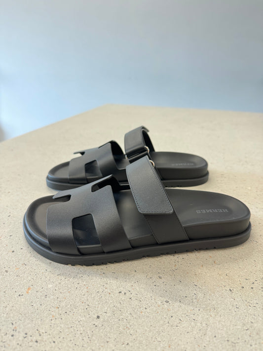 Hermes Chypre Sandals in Black - Size 38.5